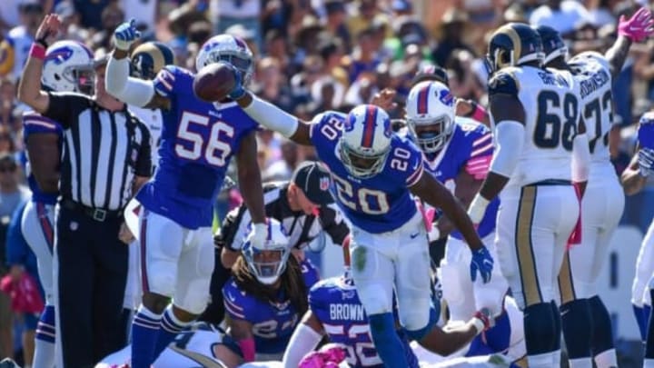 Oct 9, 2016; Los Angeles, CA, USA; Buffalo Bills free safety Corey Graham (20) celebrates recovering a fumble in the first half against the Los Angeles Rams at Los Angeles Memorial Coliseum. Mandatory Credit: Robert Hanashiro-USA TODAY Sports