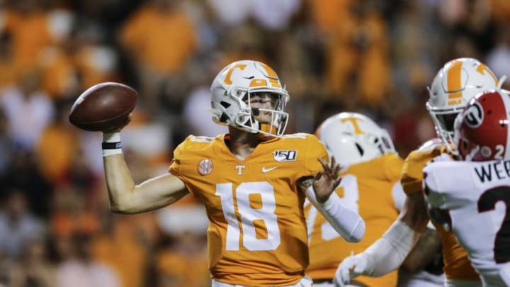 KNOXVILLE, TENNESSEE - OCTOBER 05: Brian Maurer #18 of the Tennessee Volunteers pulls back to throw a pass against the Georgia Bulldogs during the fourth quarter of the game at Neyland Stadium on October 05, 2019 in Knoxville, Tennessee. (Photo by Silas Walker/Getty Images)