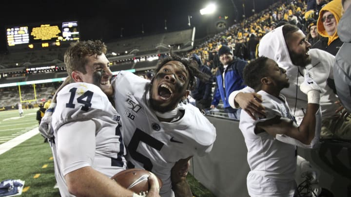 IOWA CITY, IOWA- OCTOBER 12: Quarterback Sean Clifford #14 and cornerback Tariq Castro-Fields #5 of the Penn State Nittany Lions celebrate after their match-up against the Iowa Hawkeyes, on October 12, 2019 at Kinnick Stadium in Iowa City, Iowa. (Photo by Matthew Holst/Getty Images)