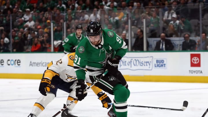 DALLAS, TEXAS – MARCH 07: Tyler Seguin #91 of the Dallas Stars skates the puck against the Nashville Predators in the third period at American Airlines Center on March 07, 2020 in Dallas, Texas. (Photo by Ronald Martinez/Getty Images)
