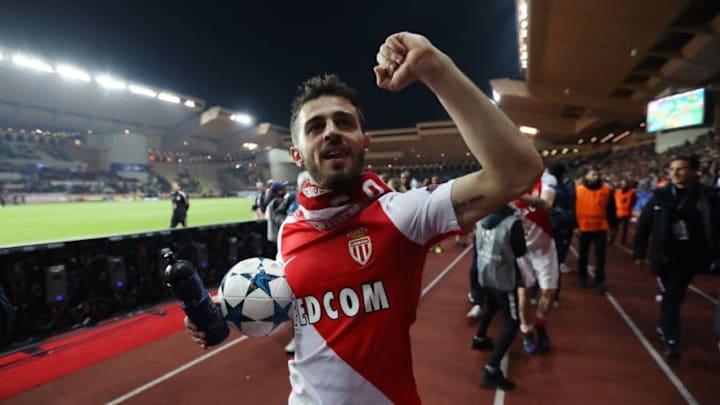 Monaco's Portuguese midfielder Bernardo Silva celebrates at the end of the UEFA Champions League round of 16 football match between Monaco and Manchester City at the Stade Louis II in Monaco on March 15, 2017. / AFP PHOTO / Valery HACHE (Photo credit should read VALERY HACHE/AFP/Getty Images)
