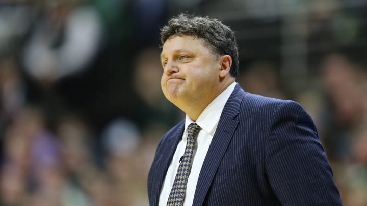 EAST LANSING, MI – DECEMBER 14: Head coach Greg Kampe of the Oakland Golden Grizzlies during the game against Michigan State Spartans at the Breslin Center on December 14, 2014 in East Lansing, Michigan. (Photo by Rey Del Rio/Getty Images)