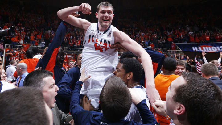 CHAMPAIGN, IL – FEBRUARY 7: Tyler Griffey #42 of the Illinois Fighting Illini is lifted up by teammates after scoring the winning basket against the Indiana Hoosiers during the game at Assembly Hall on February 7, 2013 in Champaign, Illinois. Illinois defeated No. 1 ranked Indiana 74-72. (Photo by Joe Robbins/Getty Images)