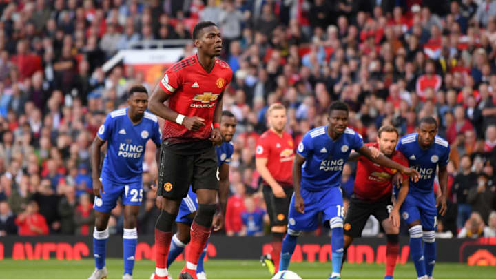 MANCHESTER, ENGLAND - AUGUST 10: Paul Pogba of Manchester United scores his team's first goal from the penalty spot during the Premier League match between Manchester United and Leicester City at Old Trafford on August 10, 2018 in Manchester, United Kingdom. (Photo by Laurence Griffiths/Getty Images)