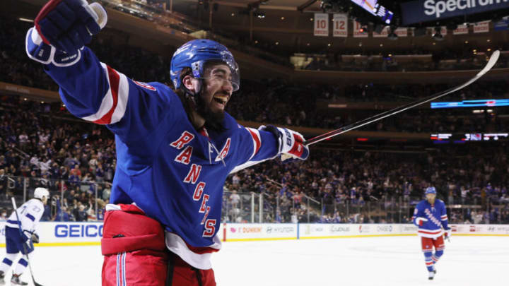 NEW YORK, NEW YORK - JANUARY 02: Mika Zibanejad #93 of the New York Rangers scores his hattrick goal at 7:44 of the second period against the Tampa Bay Lightning at Madison Square Garden on January 02, 2022 in New York City. (Photo by Bruce Bennett/Getty Images)