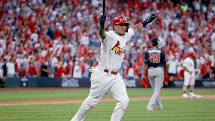 ST LOUIS, MISSOURI - OCTOBER 07: Yadier Molina #4 of the St. Louis Cardinals celebrates as he hits a walk-off sacrifice fly to give his team the 5-4 win over the Atlanta Braves in game four of the National League Division Series at Busch Stadium on October 07, 2019 in St Louis, Missouri. (Photo by Scott Kane/Getty Images)