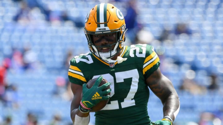 Aug 28, 2021; Orchard Park, New York, USA; Green Bay Packers running back Patrick Taylor (27) warms up prior to the game against the Buffalo Bills at Highmark Stadium. Mandatory Credit: Rich Barnes-USA TODAY Sports