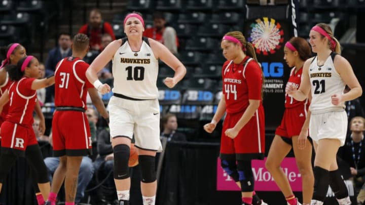 INDIANAPOLIS, IN - MARCH 09: Iowa Hawkeyes forward Megan GustafsonHear (10) reacts after getting fouled after the shot during the Women's B1G Tournament semi final game between the Iowa Hawkeyes and the Rutgers Scarlet Knights on March 09, 2019 at Bankers Life Fieldhouse, in Indianapolis Indiana.(Photo by Jeffrey Brown/Icon Sportswire via Getty Images)