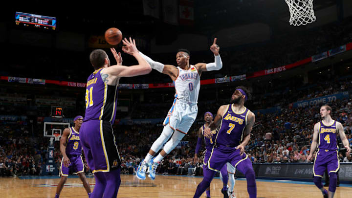 OKLAHOMA CITY, OK- APRIL 2: Russell Westbrook #0 of the Oklahoma City Thunder passes the ball against the Los Angeles Lakers on April 2, 2019 at Chesapeake Energy Arena in Oklahoma City, Oklahoma. NOTE TO USER: User expressly acknowledges and agrees that, by downloading and or using this photograph, User is consenting to the terms and conditions of the Getty Images License Agreement. Mandatory Copyright Notice: Copyright 2019 NBAE (Photo by Zach Beeker/NBAE via Getty Images)