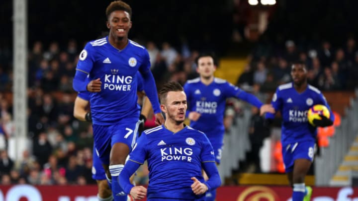 LONDON, ENGLAND - DECEMBER 05: James Maddison of Leicester City celebrates with team mates Demarai Gray and Shinji Okazaki after scoring his team's first goal during the Premier League match between Fulham FC and Leicester City at Craven Cottage on December 5, 2018 in London, United Kingdom. (Photo by Clive Rose/Getty Images)