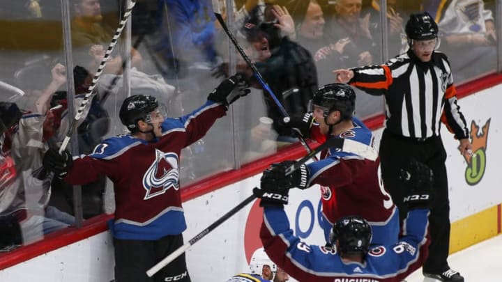 DENVER, CO - OCTOBER 19: Colorado Avalanche center Alexander Kerfoot (13) celebrates a third period goal as referee Graham Skilliter indicates a score during a regular season game between the Colorado Avalanche and the visiting St. Louis Blues on October 19, 2017, at the Pepsi Center in Denver, CO. (Photo by Russell Lansford/Icon Sportswire via Getty Images)