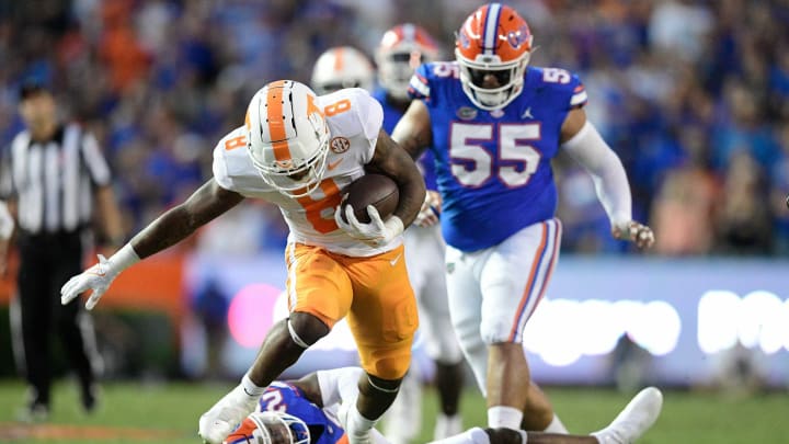 Tennessee running back Tiyon Evans (8) runs the ball during the first quarter of an NCAA football game against Florida at Ben Hill Griffin Stadium in Gainesville, Florida on Saturday, Sept. 25, 2021.Tennflorida0925 0725
