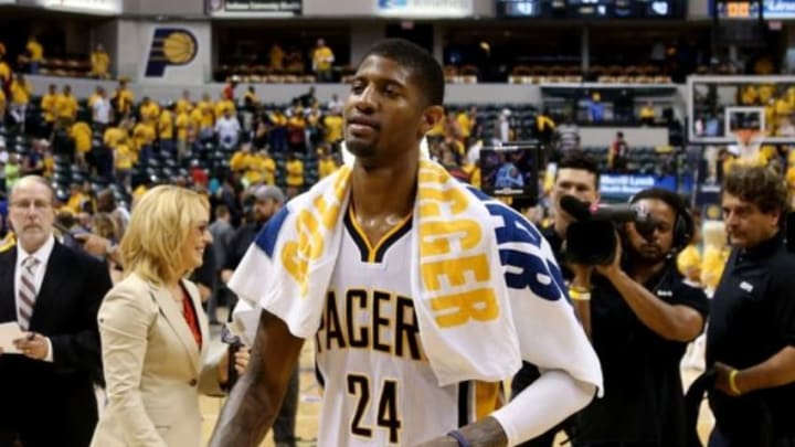 May 28, 2014; Indianapolis, IN, USA; Indiana Pacers forward Paul George (24) leaves the court after game five against the Miami Heat of the Eastern Conference Finals of the 2014 NBA Playoffs at Bankers Life Fieldhouse. Indiana defeats Miami 93-90. Mandatory Credit: Brian Spurlock-USA TODAY Sports