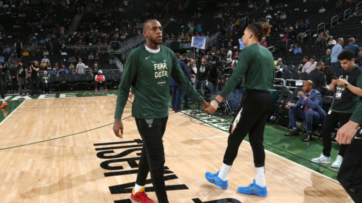 MILWAUKEE, WI - MAY 23: Khris Middleton #22 and D.J. Wilson #5 of the Milwaukee Bucks high five before Game Five of the Eastern Conference Finals against the Toronto Raptors on May 23, 2019 at the Fiserv Forum in Milwaukee, Wisconsin. NOTE TO USER: User expressly acknowledges and agrees that, by downloading and/or using this photograph, user is consenting to the terms and conditions of the Getty Images License Agreement. Mandatory Copyright Notice: Copyright 2019 NBAE (Photo by Gary Dineen/NBAE via Getty Images)