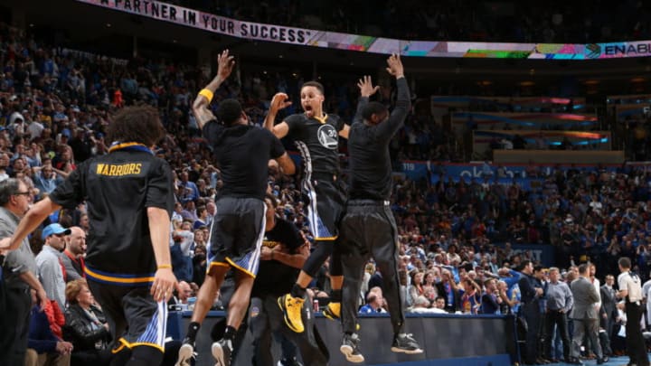 OKLAHOMA CITY, OK - FEBRUARY 27: Stephen Curry #30 of the Golden State Warriors celebrates with teammates against the Oklahoma City Thunder on February 27, 2016 at Chesapeake Energy Arena in Oklahoma City, Oklahoma. NOTE TO USER: User expressly acknowledges and agrees that, by downloading and or using this photograph, User is consenting to the terms and conditions of the Getty Images License Agreement. Mandatory Copyright Notice: Copyright 2016 NBAE (Photo by Joe Murphy/NBAE via Getty Images)