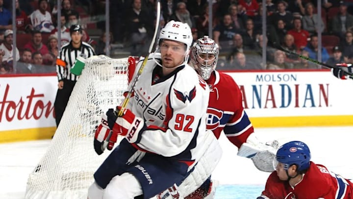 Jan 9, 2017; Montreal, Quebec, CAN; Washington Capitals center Evgeny Kuznetsov (92) reacts after scoring a goal against Montreal Canadiens goalie Carey Price (31) as defenseman Nathan Beaulieu (28) defends during the third period at Bell Centre. Mandatory Credit: Jean-Yves Ahern-USA TODAY Sports