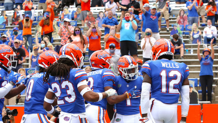 Nov 28, 2020; Gainesville, FL, USA; Florida Gators players celebrate with Kadarius Toney (1) after Toney scored a touchdown on a punt return during a football game against the Kentucky Wildcats at Ben Hill Griffin Stadium in Gainesville, Fla. Nov. 28, 2020. Mandatory Credit: Brad McClenny-USA TODAY NETWORK