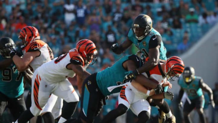 JACKSONVILLE, FL – NOVEMBER 05: Yannick Ngakoue #91 and Calais Campbell #93 of the Jacksonville Jaguars put pressure on Andy Dalton #14 of the Cincinnati Bengals in the second half of their game at EverBank Field on November 5, 2017 in Jacksonville, Florida. (Photo by Logan Bowles/Getty Images)