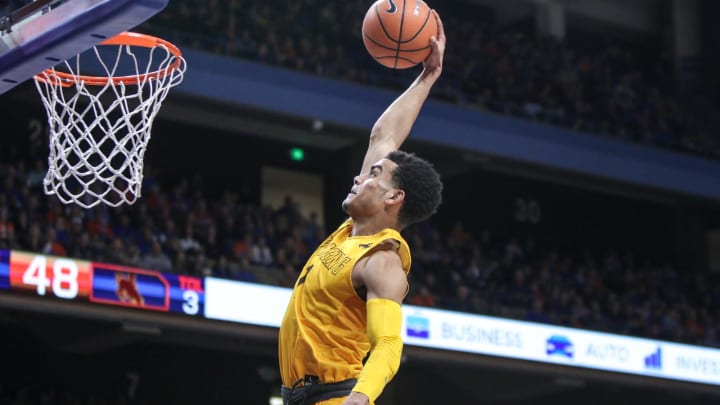 BOISE, ID – MARCH 03: Guard Justin James #1 of the Wyoming Cowboys turns a fast break into a slam dunk during second half action against the Boise State Broncos on March 03, 2018 at Taco Bell Arena in Boise, Idaho. Boise State won the game 95-87. (Photo by Loren Orr/Getty Images)