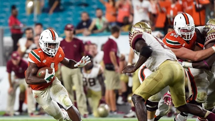 Oct 8, 2016; Miami Gardens, FL, USA; Miami Hurricanes running back Mark Walton (1) carries the ball during the first half against Florida State Seminoles at Hard Rock Stadium. Mandatory Credit: Steve Mitchell-USA TODAY Sports