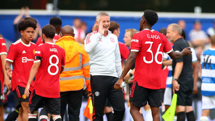 LONDON, ENGLAND - JULY 24: Manchester United Manager Ole Gunnar Solskjaer high fives Anthony Elanga of Manchester United the Pre-season Friendly between Queens Park Rangers and Manchester United at The Kiyan Prince Foundation Stadium on July 24, 2021 in London, England. (Photo by Chloe Knott - Danehouse/Getty Images)