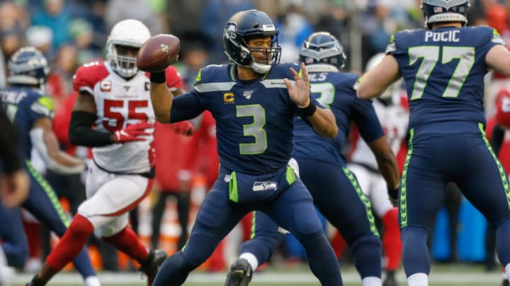 SEATTLE, WA - DECEMBER 22: Quarterback Russell Wilson #3 of the Seattle Seahawks passes against the Arizona Cardinals at CenturyLink Field on December 22, 2019 in Seattle, Washington. (Photo by Otto Greule Jr/Getty Images)