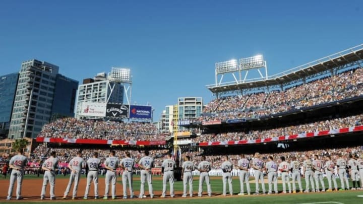 Jul 12, 2016; San Diego, CA, USA; National League players line up for the national anthem before the 2016 MLB All Star Game at Petco Park. Mandatory Credit: Gary A. Vasquez-USA TODAY Sports