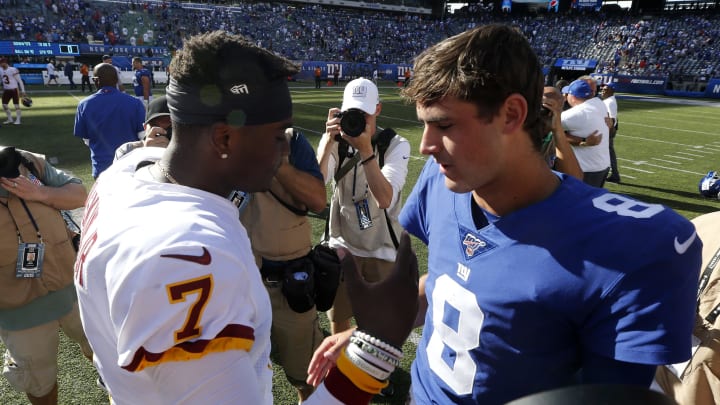 EAST RUTHERFORD, NEW JERSEY – SEPTEMBER 29: (NEW YORK DAILIES OUT) Dwayne Haskins #7 of the Washington Redskins and Daniel Jones #8 of the New York Giants meet after their game at MetLife Stadium on September 29, 2019 in East Rutherford, New Jersey. The Giants defeated the Redskins 24-3. (Photo by Jim McIsaac/Getty Images)