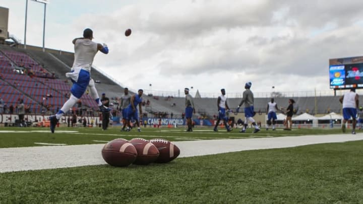 Dec 26, 2015; Shreveport, LA, USA; General view of footballs as Tulsa Golden Hurricane players warm up before the Independence Bowl against the Virginia Tech Hokies at Independence Stadium. Arizona Football Mandatory Credit: Troy Taormina-USA TODAY Sports