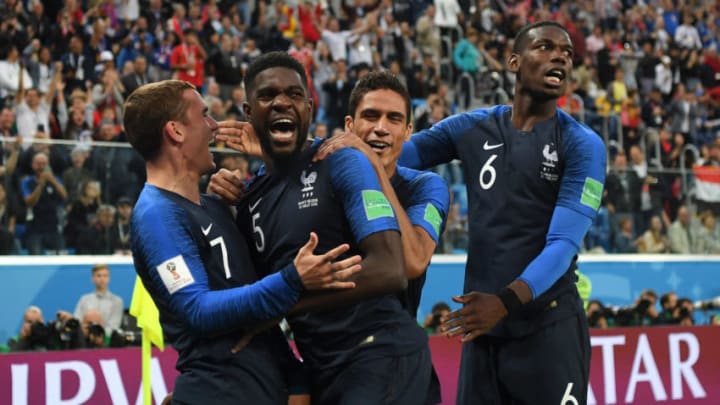 SAINT PETERSBURG, RUSSIA - JULY 10: Samuel Umtiti of France celebrates with team mates after scoring his team's first goal during the 2018 FIFA World Cup Russia Semi Final match between Belgium and France at Saint Petersburg Stadium on July 10, 2018 in Saint Petersburg, Russia. (Photo by Shaun Botterill/Getty Images)