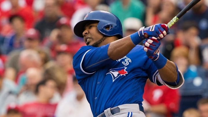 Jun 16, 2016; Philadelphia, PA, USA; Toronto Blue Jays designated hitter Edwin Encarnacion (10) hits a two-run home run during the first inning against the Philadelphia Phillies at Citizens Bank Park. Mandatory Credit: Bill Streicher-USA TODAY Sports