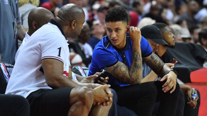 LAS VEGAS, NV - JULY 10: Kyle Kuzma (R) #0 of the Los Angeles Lakers talks with Los Angeles Lakers president of basketball operations Earvin 'Magic' Johnson during the 2018 NBA Summer League at the Thomas & Mack Center on July 10, 2018 in Las Vegas, Nevada. NOTE TO USER: User expressly acknowledges and agrees that, by downloading and or using this photograph, User is consenting to the terms and conditions of the Getty Images License Agreement. (Photo by Sam Wasson/Getty Images)