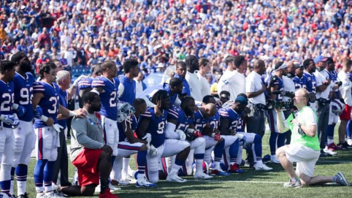 ORCHARD PARK, NY - SEPTEMBER 24: Buffalo Bills players kneel during the American National anthem before an NFL game against the Denver Broncos on September 24, 2017 at New Era Field in Orchard Park, New York. (Photo by Brett Carlsen/Getty Images)