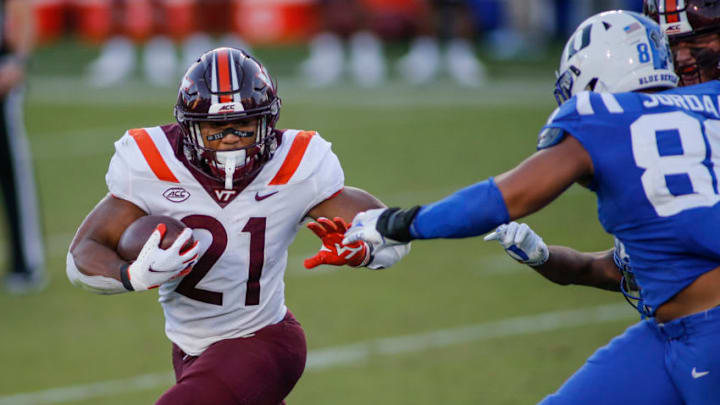 Former Kansas football running back Khalil Herbert (21) carries the football. Mandatory Credit: Nell Redmond-USA TODAY Sports
