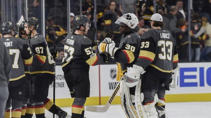 LAS VEGAS, NV - OCTOBER 15: Goalie Malcolm Subban #30 is congratulated by his teammate David Perron #57 of the Vegas Golden Knights after getting his first career NHL victory against the Boston Bruins during the game at T-Mobile Arena on October 15, 2017 in Las Vegas, Nevada. (Photo by Todd Lussier/NHLI via Getty Images)