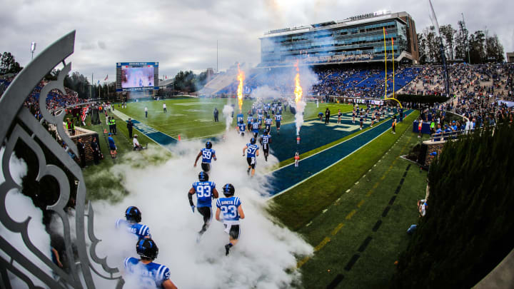 Nov 12, 2022; Durham, North Carolina, USA; Duke Blue Devils run out just before the first half against Virginia Tech at Wallace Wade Stadium. Mandatory Credit: Jaylynn Nash-USA TODAY Sports