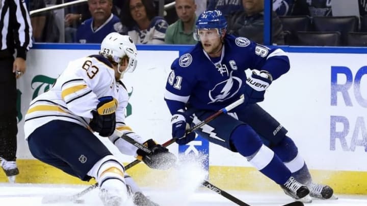 Nov 10, 2015; Tampa, FL, USA; Tampa Bay Lightning center Steven Stamkos (91) skates with the puck as Buffalo Sabres left wing Tyler Ennis (63) defends during the second period at Amalie Arena. Mandatory Credit: Kim Klement-USA TODAY Sports