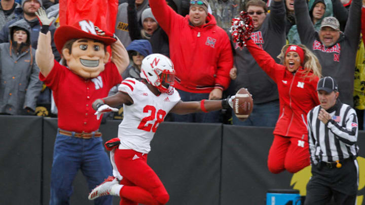 IOWA CITY, IOWA- NOVEMBER 23: Running back Maurice Washington #28 of the Nebraska Cornhuskers runs in a touchdown in the second half against the Iowa Hawkeyes, on November 23, 2018 at Kinnick Stadium, in Iowa City, Iowa. (Photo by Matthew Holst/Getty Images)