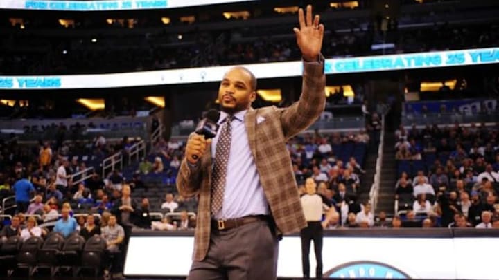Apr 16, 2014; Orlando, FL, USA; Orlando Magic guard Jameer Nelson addresses the crowd in street clothes before the start of the game against the Indiana Pacers at Amway Center. Mandatory Credit: David Manning-USA TODAY Sports