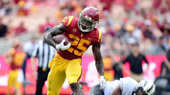 LOS ANGELES, CA – SEPTEMBER 02: Ronald Jones II #25 of the USC Trojans breaks two Western Michigan Broncos tackles on his way to a touchdown to take a 35-28 lead during the fourth quarter at Los Angeles Memorial Coliseum on September 2, 2017 in Los Angeles, California. (Photo by Harry How/Getty Images)