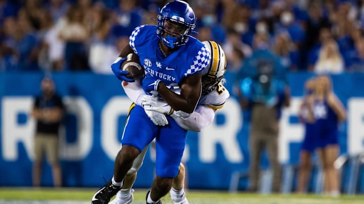 Sep 11, 2021; Lexington, Kentucky, USA; Kentucky Wildcats wide receiver Izayah Cummings (84) is tackled by Missouri Tigers linebacker Blaze Alldredge (25) during the second quarter at Kroger Field. Mandatory Credit: Jordan Prather-USA TODAY Sports