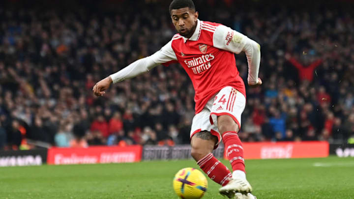 TOPSHOT - Arsenal's English midfielder Reiss Nelson shoots and scores the third goal of the team during the English Premier League football match between Arsenal and Bournemouth at the Emirates Stadium in London on March 4, 2023. (Photo by Glyn KIRK / AFP) / RESTRICTED TO EDITORIAL USE. No use with unauthorized audio, video, data, fixture lists, club/league logos or 'live' services. Online in-match use limited to 120 images. An additional 40 images may be used in extra time. No video emulation. Social media in-match use limited to 120 images. An additional 40 images may be used in extra time. No use in betting publications, games or single club/league/player publications. / (Photo by GLYN KIRK/AFP via Getty Images)