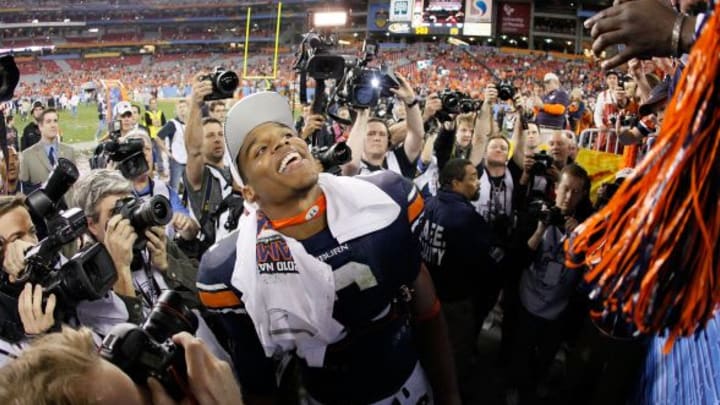 GLENDALE, AZ – JANUARY 10: Quarterback Cameron Newton #2 of the Auburn Tigers celebrates their 22-19 victory after defeating the Oregon Ducks in the Tostitos BCS National Championship Game at University of Phoenix Stadium on January 10, 2011 in Glendale, Arizona. (Photo by Kevin C. Cox/Getty Images)