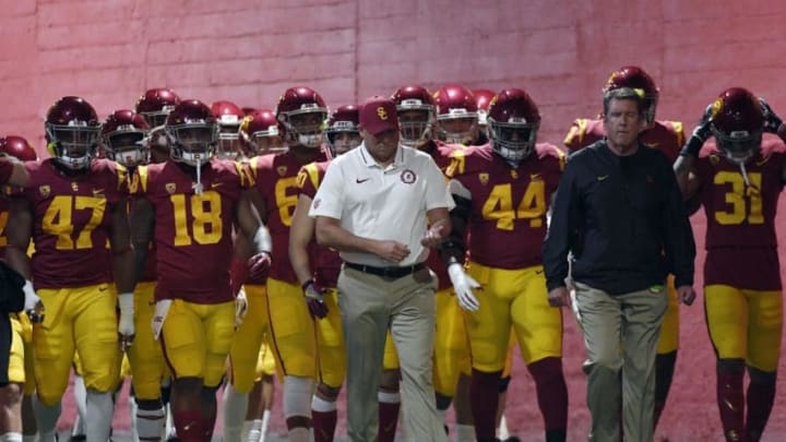 LOS ANGELES, CA - NOVEMBER 24: Head coach Clay Helton of the USC Trojans walks his team down the tunnel at Los Angeles Memorial Coliseum to play against the Notre Dame Fighting Irish on November 24, 2018 in Los Angeles, California. (Photo by Kevork Djansezian/Getty Images)