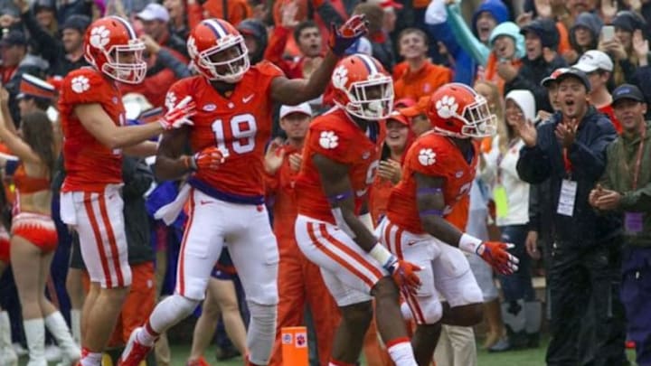 Oct 10, 2015; Clemson, SC, USA; Clemson Tigers running back Wayne Gallman (9) celebrates with teammates after scoring a touchdown during the first quarter against the Georgia Tech Yellow Jackets at Clemson Memorial Stadium. Mandatory Credit: Joshua S. Kelly-USA TODAY Sports