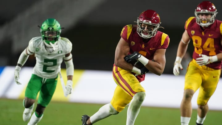 Dec 18, 2020; Los Angeles, California, USA; Southern California Trojans wide receiver Bru McCoy (4) carries the ball against the Oregon Ducks during the Pac-12 Championship at United Airlines Field at Los Angeles Memorial Coliseum. Oregon defeated USC 31-24. Mandatory Credit: Kirby Lee-USA TODAY Sports