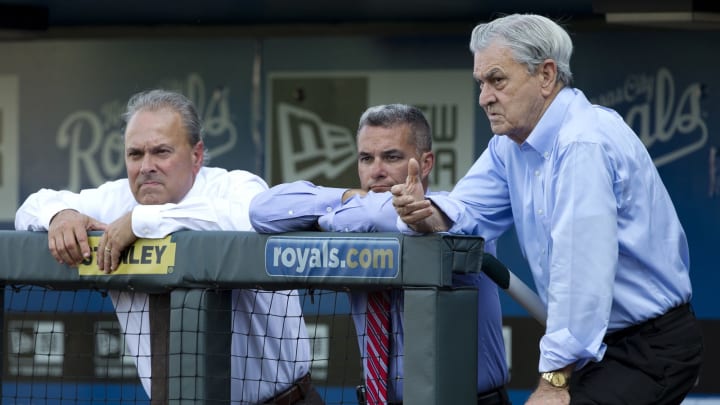 Kansas City Royals owner David Glass, right, visits with general manager Dayton Moore and team president Dan Glass  (John Sleezer/Kansas City Star/MCT via Getty Images)