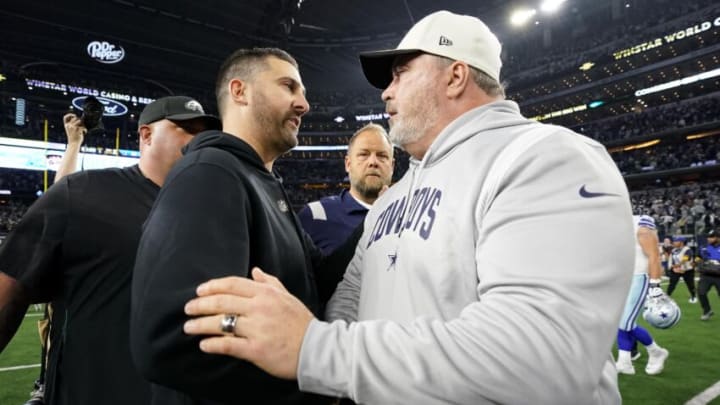 ARLINGTON, TEXAS - DECEMBER 24: Head coach Nick Sirianni of the Philadelphia Eagles and head coach Mike McCarthy of the Dallas Cowboys embrace after a game between the Dallas Cowboys and the Philadelphia Eagles at AT&T Stadium on December 24, 2022 in Arlington, Texas. (Photo by Sam Hodde/Getty Images)