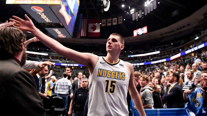 DENVER, CO - APRIL 9: Nikola Jokic (15) of the Denver Nuggets high fives fans as he walks off the court after the second half of the Nuggets' 88-82 win over the Portland Trail Blazers on Monday, April 9, 2018. (Photo by AAron Ontiveroz/The Denver Post via Getty Images)