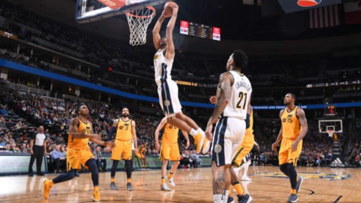 DENVER, CO – DECEMBER 26: Trey Lyles #7 of the Denver Nuggets drives to the basket against the Utah Jazz on December 26, 2017 at the Pepsi Center in Denver, Colorado. NOTE TO USER: User expressly acknowledges and agrees that, by downloading and/or using this photograph, user is consenting to the terms and conditions of the Getty Images License Agreement. Mandatory Copyright Notice: Copyright 2017 NBAE (Photo by Bart Young/NBAE via Getty Images)